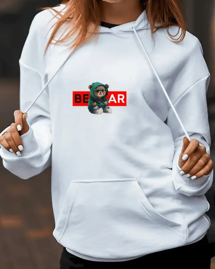 White hoodie with bear design – customizable Woman wearing a white hoodie with a creative bear design – perfect for personalizing and as a custom one-off piece.