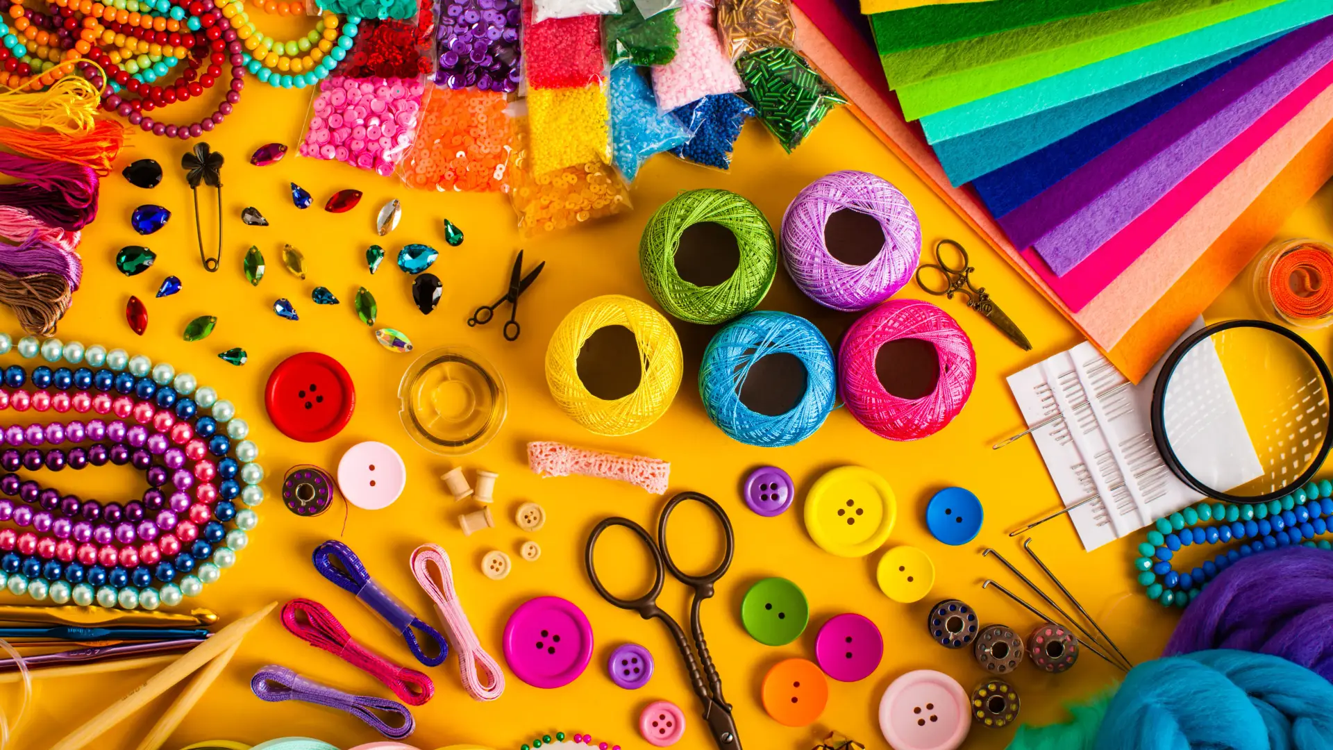 DIY Craft Materials for T-Shirt Design & Creative Projects Craft materials for DIY projects: thread, buttons, felt & beads for creative T-shirt design and textile upcycling.